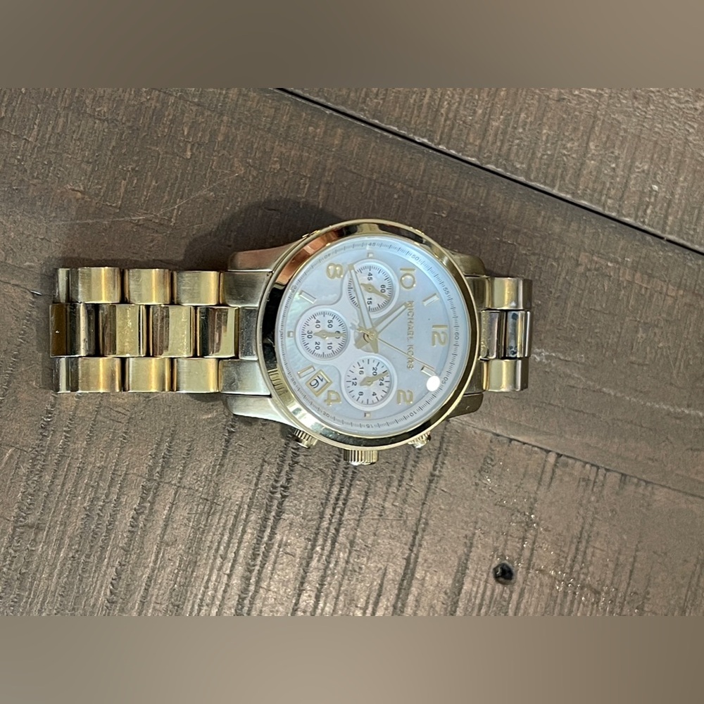 Michael kors over size women’s watch.
